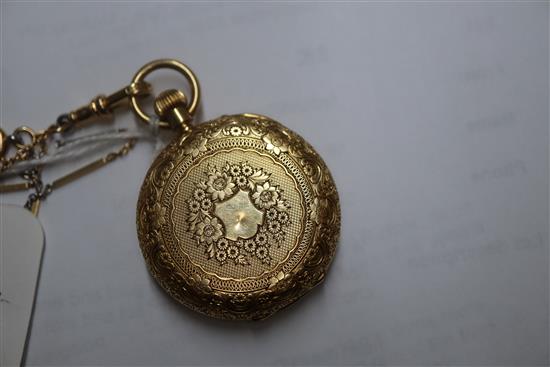 A Victorian 18ct engraved gold and enamel half hunter fob watch, on 18ct and plat albert chain.